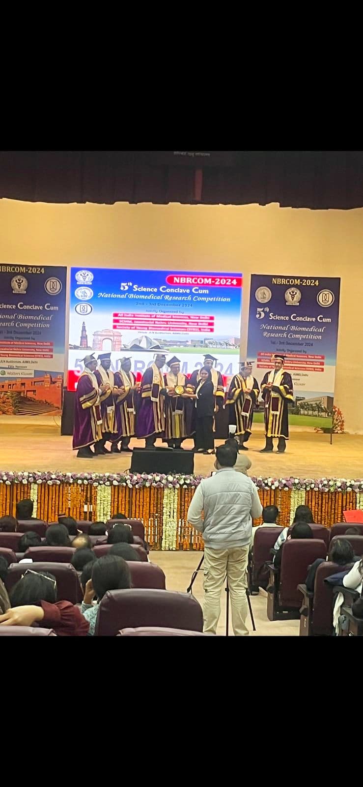 Award plaques and a ceremony on stage