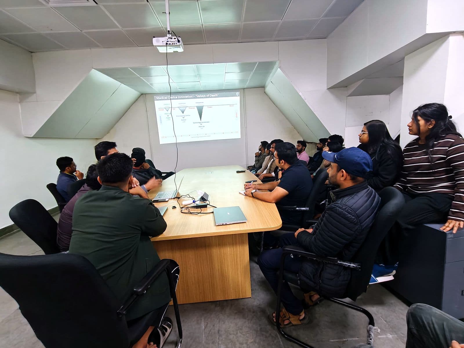 Discussion session around a meeting-room table