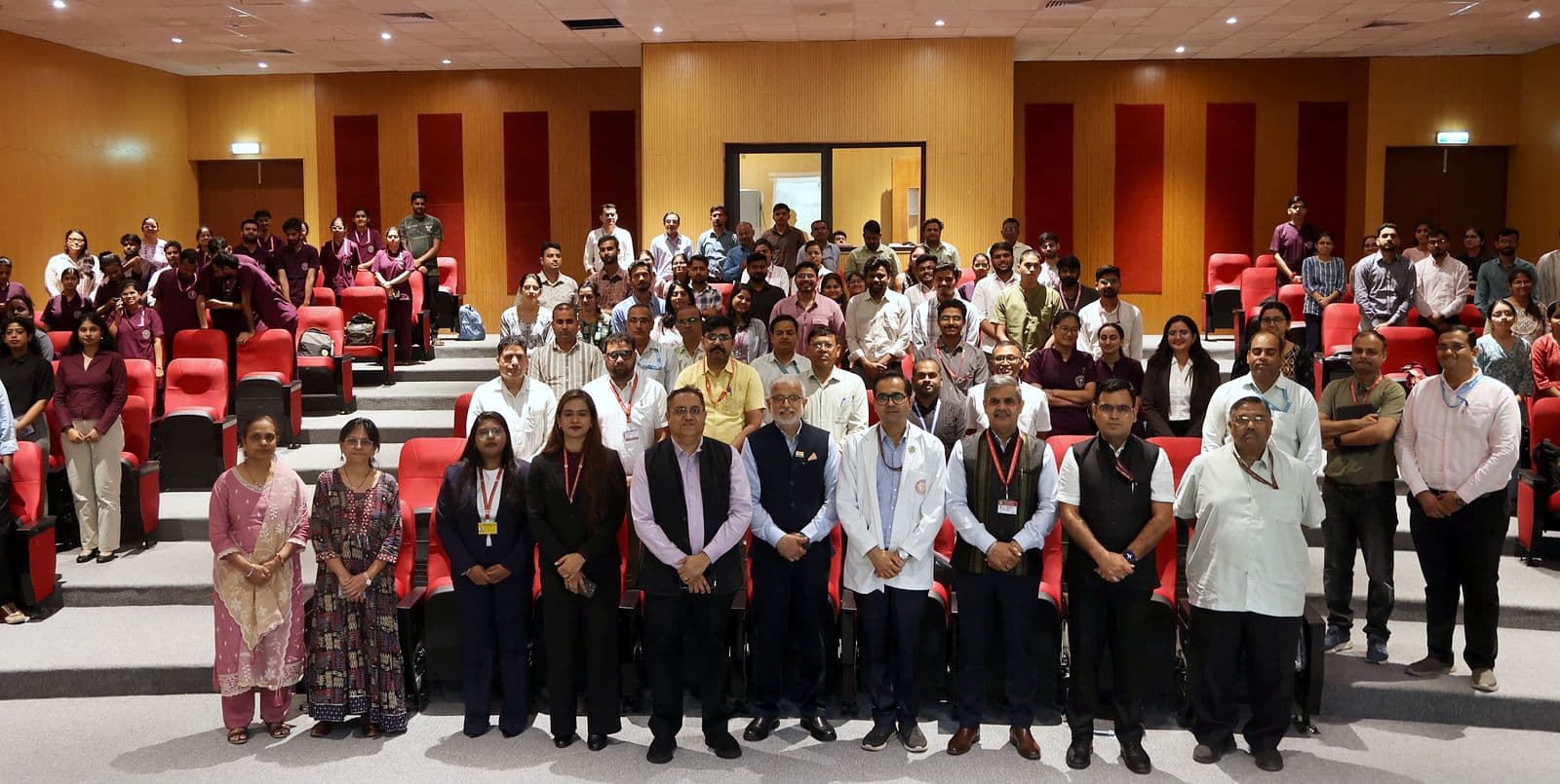 Group photograph in an auditorium